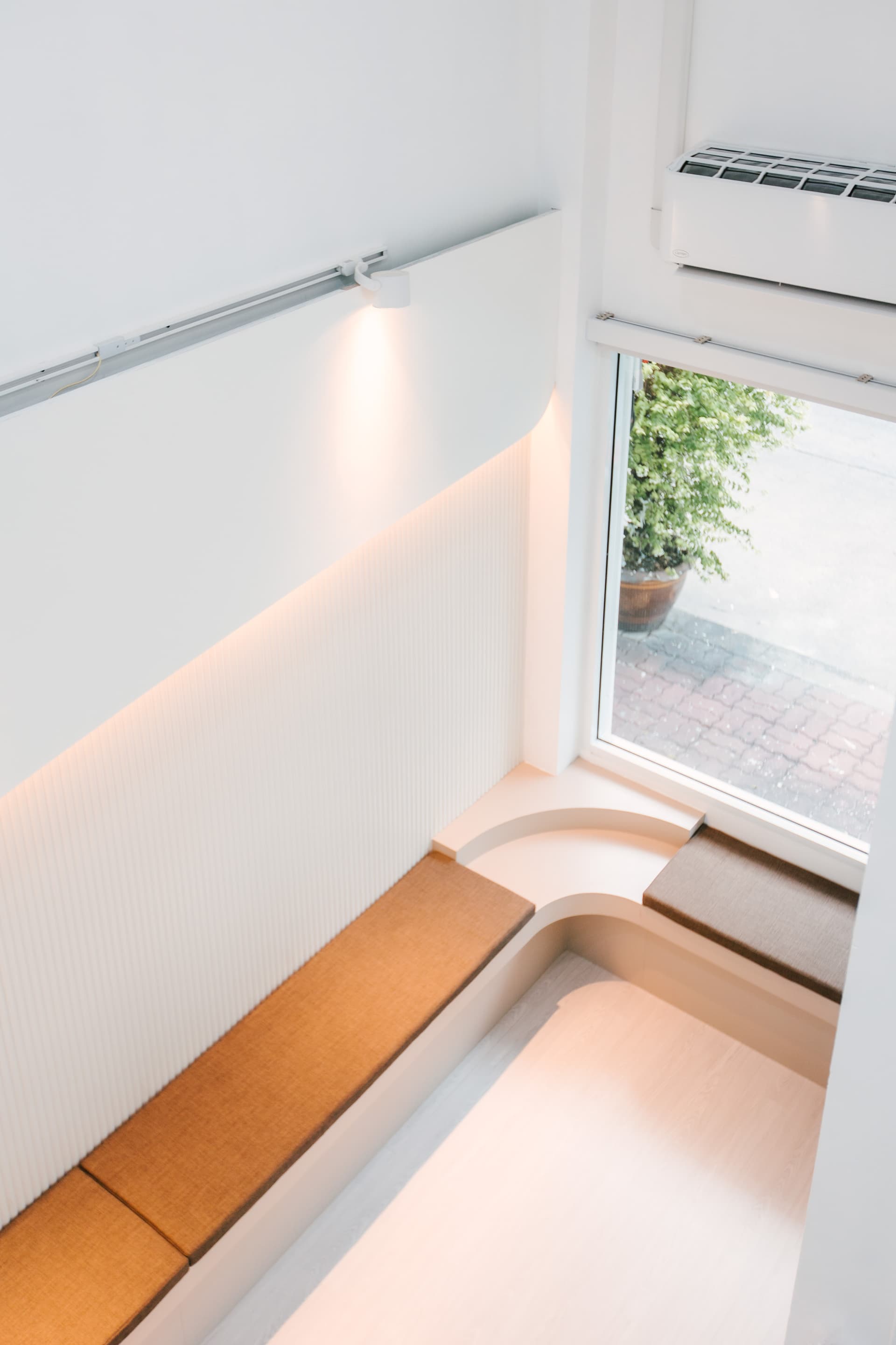 Waiting area from above with curved bench seating