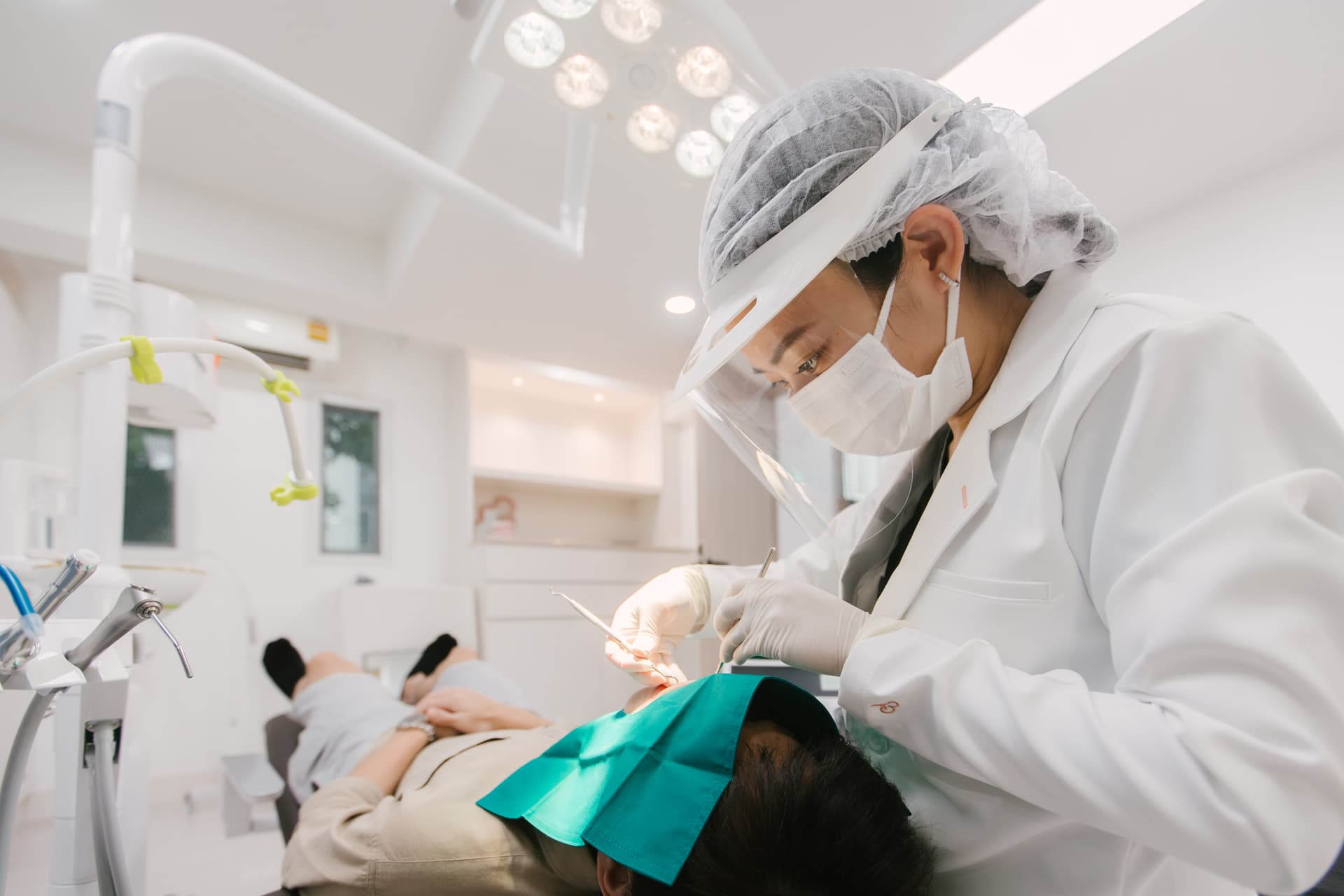 Dental team at work in modern treatment room