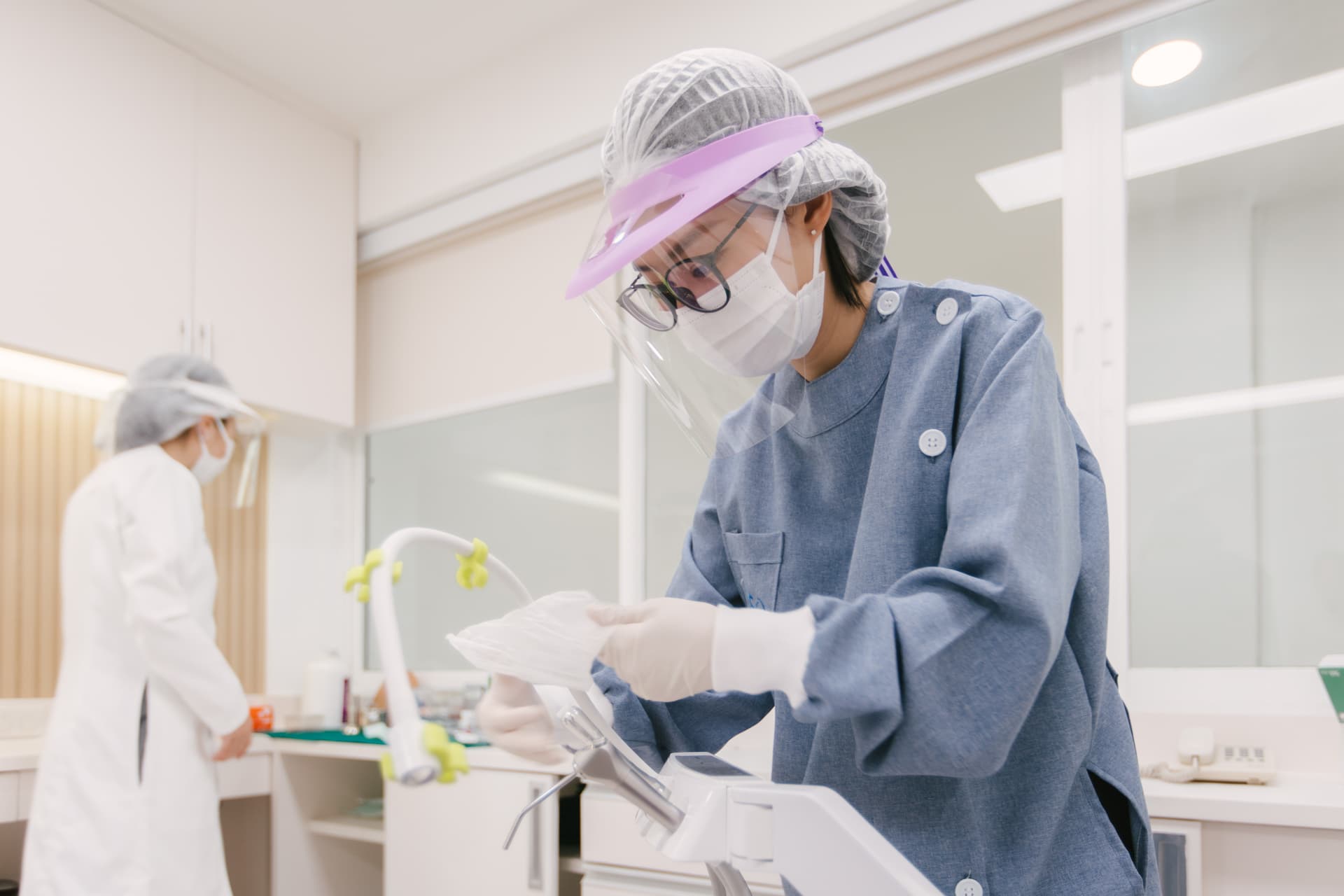 Doctor performing dental examination