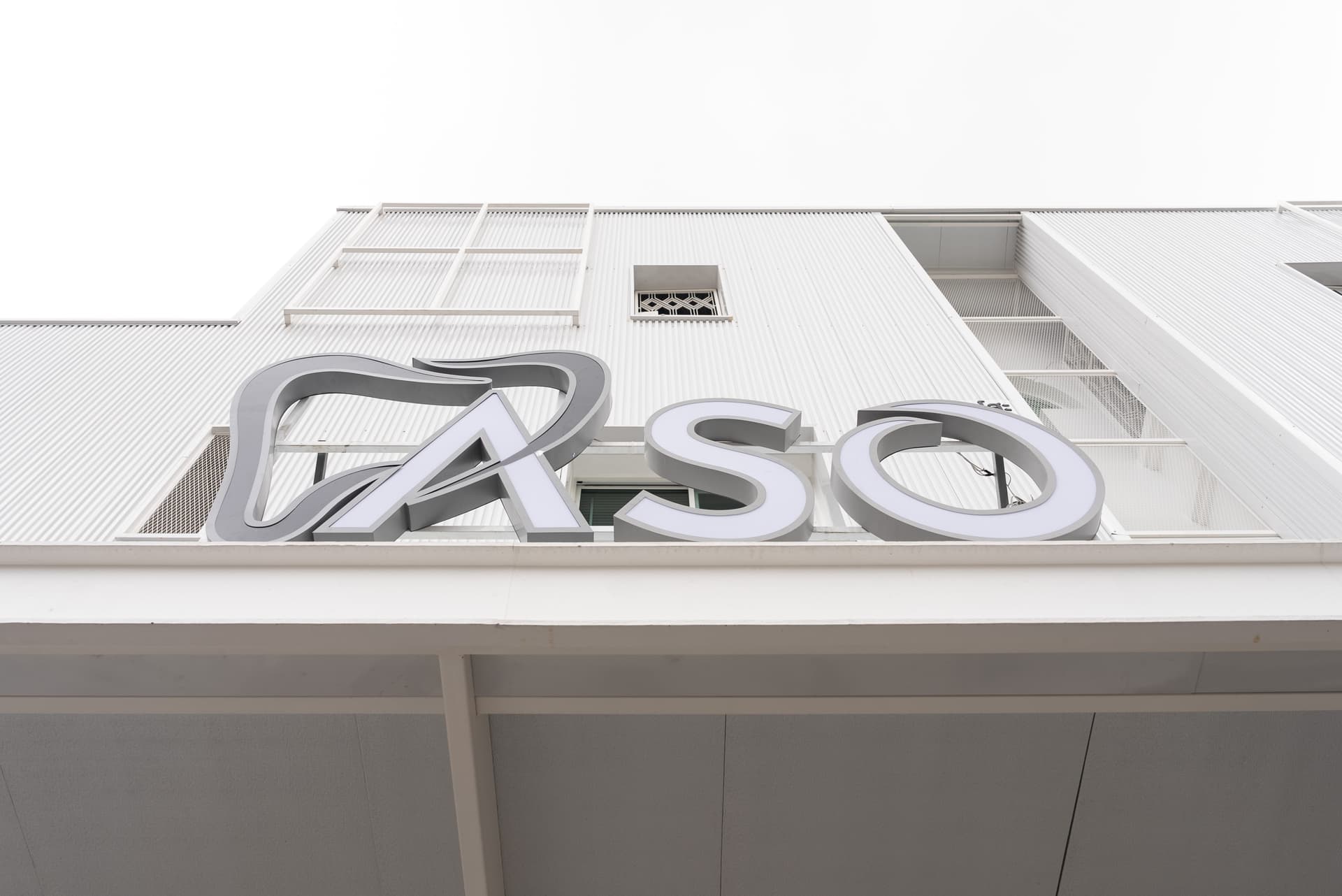 Dental assistant operating X-ray machine